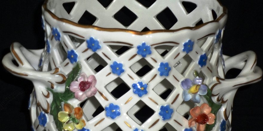 Basket - Canasta Sevres perforated with blue and orange flowers in relief, with a size of 6 inches high and 4 inches in diameter. Sevres con decoración a mano con flores azules...